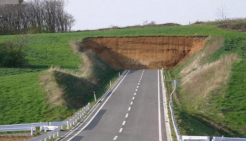 A road going straight in a wall