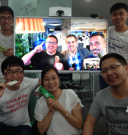 A team sharing food remotely between offices