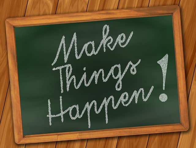 "Make things happen" written on a blackboard