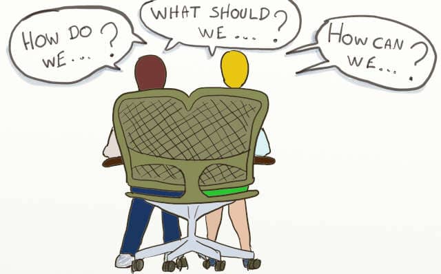 Drawing of 2 programmers sitting on a double chair, asking many questions about pair programming