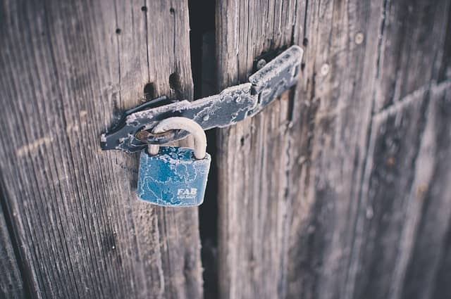 A picture of a locked door. Domain Driven Design can remain shut to people because of its awkward vocabulary. Many people will judge it too abstract and only work astronaut architecture.