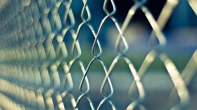 Close up photograph of a chainlink. There are barriers to overcome when starting TDD for Legacy Code