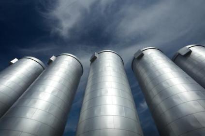 Silos under a grey sky