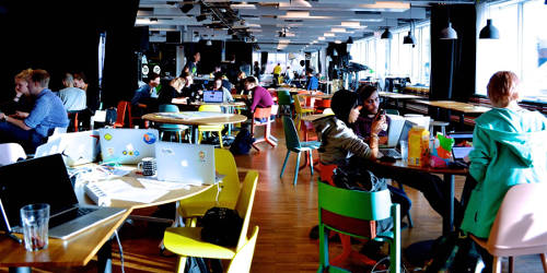 A photo of Spotify's open space during a Hackathon