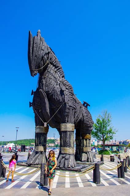Photo of a wood statue of the Trojan Horse. Having an ex-developer among the domain experts is a great hack to inject DDD and Event Storming in your organization