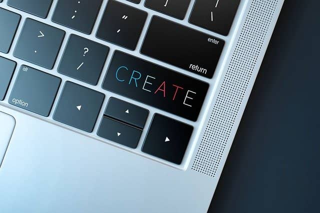 Photograph of a keyboard with the 'SHIFT' key replaced by a 'CREATE' key. Growing an Agile Technical Coaching offer is a creative endeavor, like an internal startup