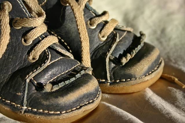 Photo of used and small children shoes. Using TCR has taught us again to code in baby steps.