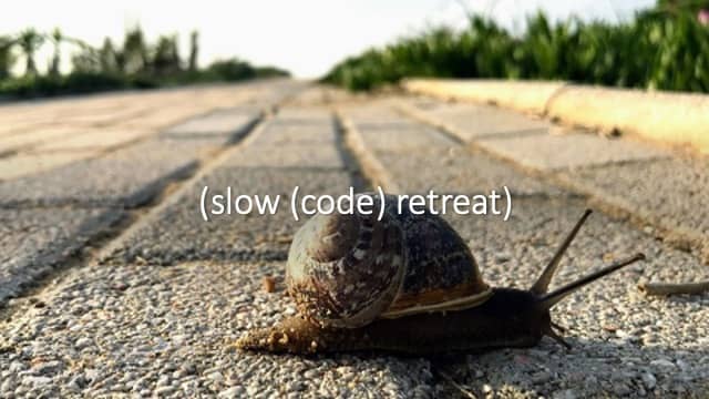 First slide of the Slow Code Retreat workshop. It shows a snail crossing the street, with the title of the workshop written.